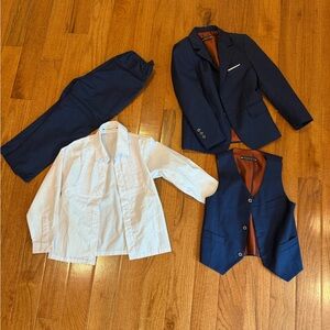 Boys size 5 three piece navy suit with shirt. Perfect condition